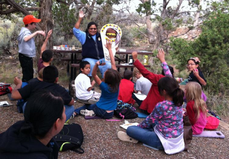 Students learning about Ute cultural artifacts