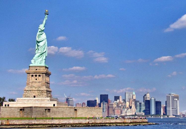 The Statue of Liberty against the Manhattan skyline.