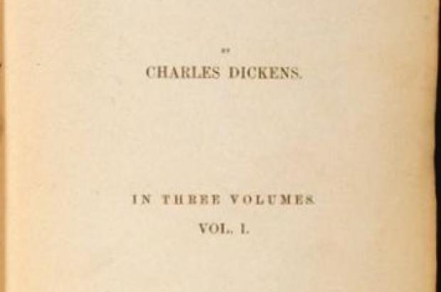 Single page of aged paper reading: Great Expectations by Charles Dickens in Three Volumes: Vol I