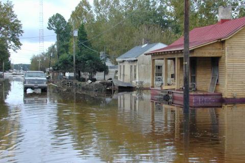 Photograph of flooded neighborhood street 