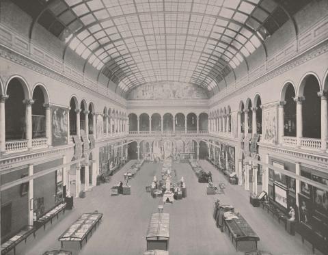 Central hall with skylight and arcades, exhibit cases on the floor