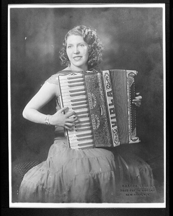 Accordionist Viola Turpeinen sitting down