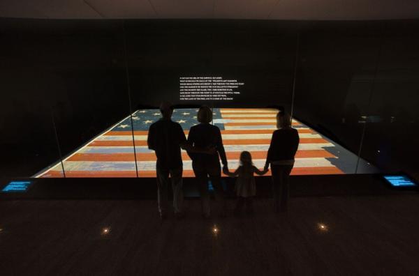 Visitors view the Star-Spangled Banner