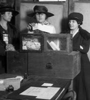 Three suffragists casting votes in New York City, 1917.