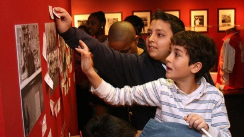 Students at an exhibition on Yemen
