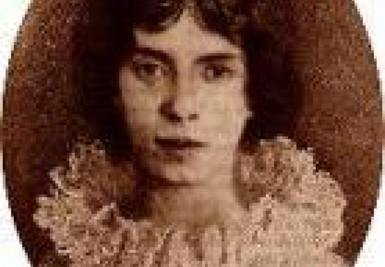 photo of emily dickinson, dark hair, wearing a ruffled collar dress, in a round frame