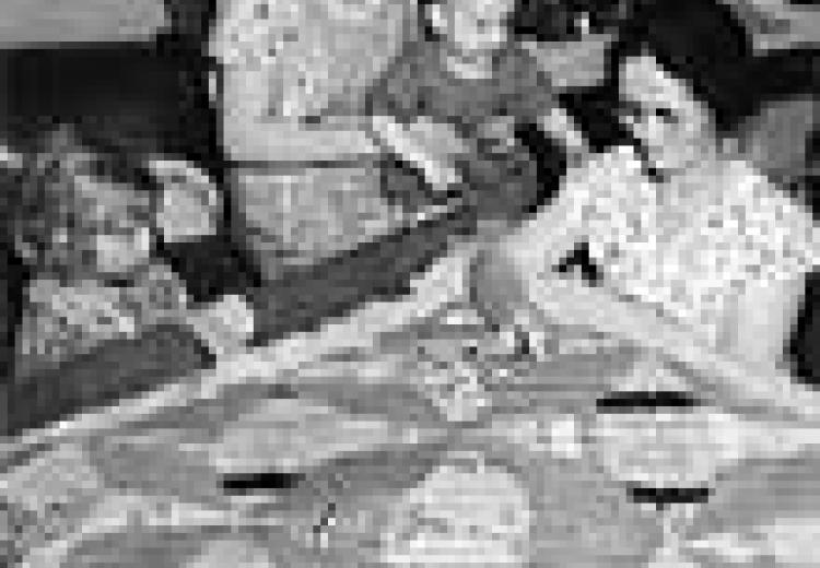 A quilting party in an Alvin, Wisconsin, home.