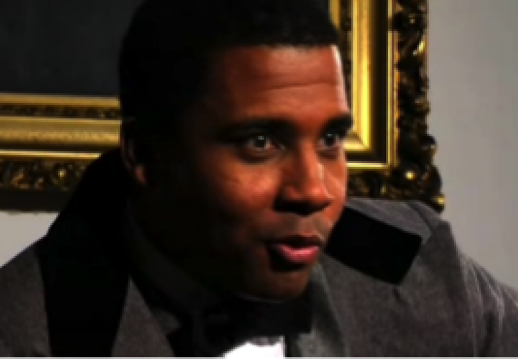 Photo of reenactment of Henry "Box" Brown telling his story of escape.