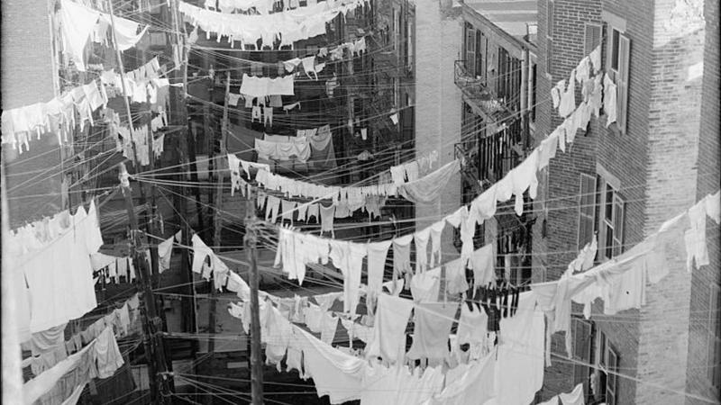 Yard of a tenement at Park Avenue and 107th St., New York, 1900.
