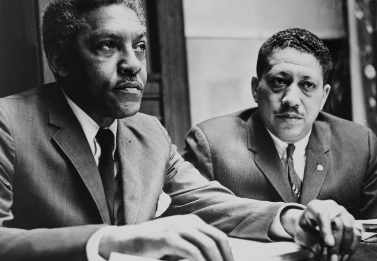 Bayard Rustin and Dr. Eugene Reed conduct are interviewed about the Vietnam War at Freedom House. Photo by Al Ravenna.