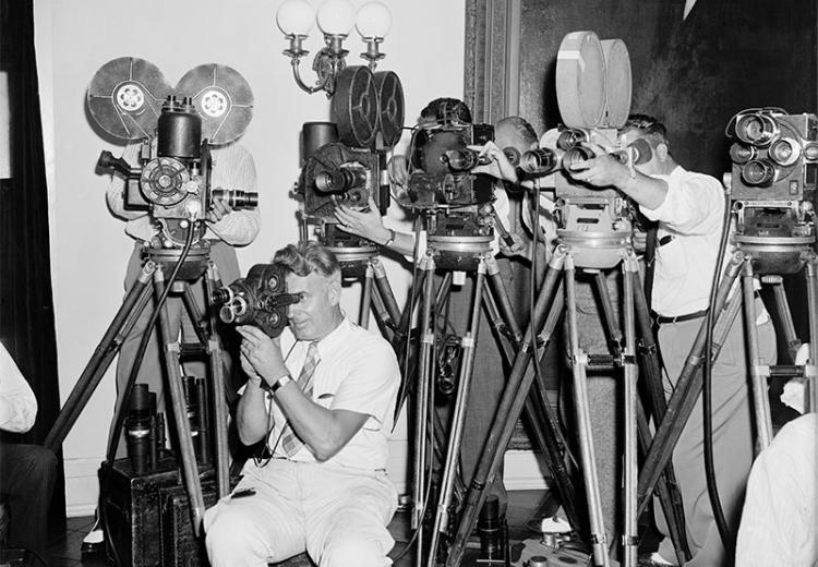 Photograph of the newsreel press at a 1939 fireside chat on the invasion of Poland, 1939.