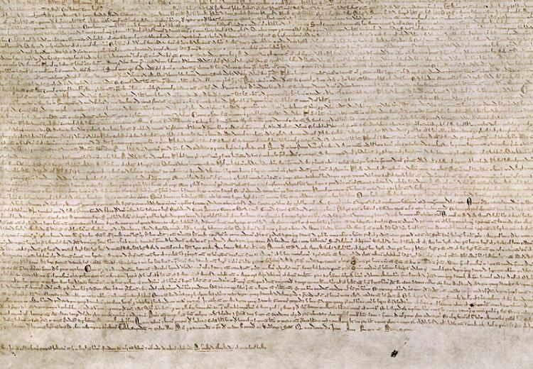 The Magna Carta of 1215, written in iron gall ink on parchment in medieval Latin.